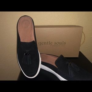 Black suede slides with tassels by Gentle Souls